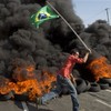 Tear gas and rubber bullets used on protesters demonstrating against Brazil World Cup