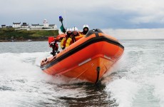 Fisherman rescued after boat runs aground