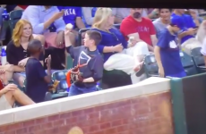 This kid at a baseball game just pulled off the smoothest move of the year