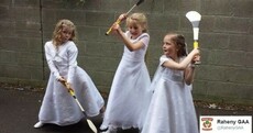Young GAA stars can't part with their hurleys on Communion day