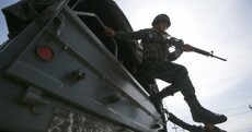 Martial law declared as armed troops take to streets of Thailand