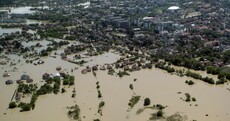 "This is Armageddon": Thousands flee Balkans floods in Bosnia's worst exodus since war