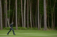 Lowry puts pressure on leader Bjorn as McIlroy hits form