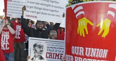 Pics: McDonald's workers continue protest over low wages