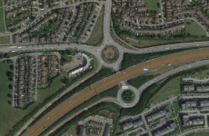 Woman dies after falling from bridge on M50