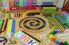 This mammoth domino set falling over is enormously satisfying to watch