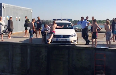 Police in Denmark let teens use their car as makeshift waterslide