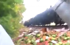 Train smashes into watermelon lorry, watermelons go EVERYWHERE