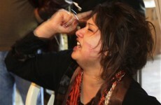 Libyan woman who claims she was raped by Gaddafi's troops arrives in Romania