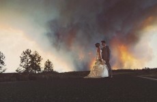 A couple used a raging wildfire as a backdrop for this amazing wedding photo