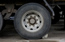 Man dies after axle of truck falls on him