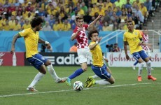Brazil's Marcelo scores the first (own) goal of the 2014 World Cup