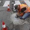 A man is filling Chicago's potholes with wonderful mosaics
