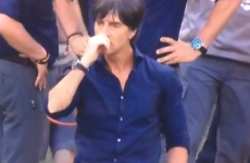 Jogi Löw picks his nose, then shakes Cristiano Ronaldo's hand