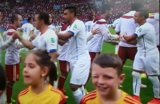 Snapshot: 10-year-old Dubliner Ciarán Duffy winks at the world from the Maracanã pitch