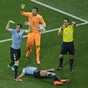 Uruguay's Álvaro Pereira plays on after serious knock to the head