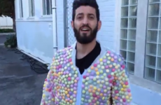 Man wearing a suit of Mentos gets into a tank of Diet Coke