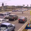 Watch this motorcyclist flip and land on his feet after crashing into a car