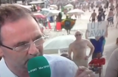 Martin O'Neill photobombed on the Copacabana by man with an 'Up Cavan' sign
