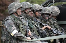Killer soldier who shot dead five colleagues captured after tense standoff