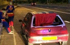 Men wearing superman outfits pulled over for driving car with red cape