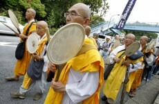 Thousands attend anti-nuclear rallies in Japan to mark earthquake and tsunami