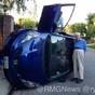 Old couple pose for the best picture ever after their car flips