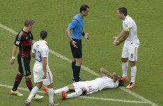 Jermaine Jones floored by referee and Good-night John Boye for Ghana