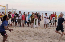 Arsene Wenger recreates Robin van Persie's diving header on Brazilian beach