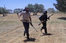 Rebels smuggle weapons from Tunisia into Libya, as Gaddafi vows to fight to death