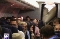 Plane's evacuation slide accidentally inflates in mid-flight... inside the cabin
