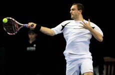 Niland squeezes through Wimbledon qualification thriller