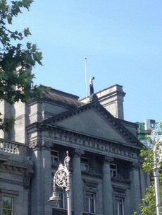 Man who spent over four hours on six-storey Dame Street building taken away safely
