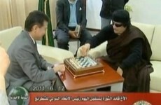 Checkmates: Colonel Gaddafi plays chess with renowned Russian eccentric