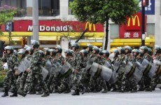 Chinese forces restore calm after weekend of rioting