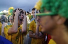 7 pictures of distraught Brazil fans, 1 of Heidi Klum celebrating