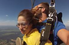Skydiving instructor gets hit in the face with a shoe mid-air