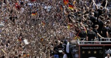 Germany dance back into Berlin on massive open-top Merc truck