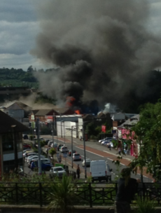 Four fire units are fighting a blaze in Bray town