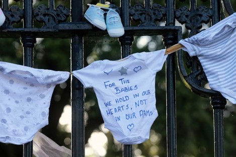 Justice for the Tuam Babies march. Items of baby clothing were tied to the railings at the back of Leinster House.