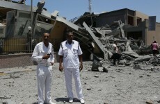 NATO bombs Gaddafi's compound while son says elections are possible