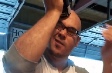 Guy pours a beer using nothing but his forehead