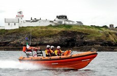 Man brought to hospital by helicopter after falling from cliffs
