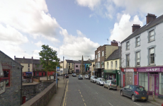 An 84-year-old woman has died after being hit by a lorry, a man has been arrested