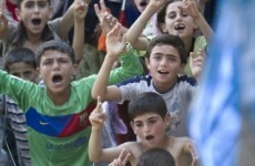 Protests continue in Syria as troops move into towns