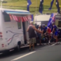 Tour de France cyclist stops to use fan's camper van for emergency toilet break
