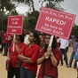 Rain halts exhumation of bodies of girls who were gang-raped and lynched