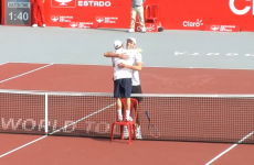 Dudi Sela needed a hug after losing to 6'11" Ivo Karlovic, so he grabbed a chair to stand on