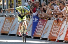 Rogers finally wins a Tour de France stage, takes a bow as he crosses the line