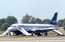 15 injured after plane catches fire on landing